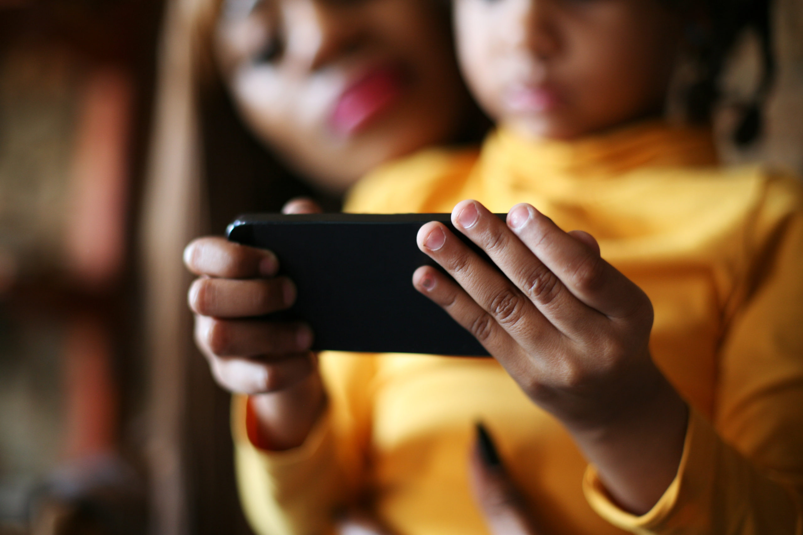Mom teaching child tech safety