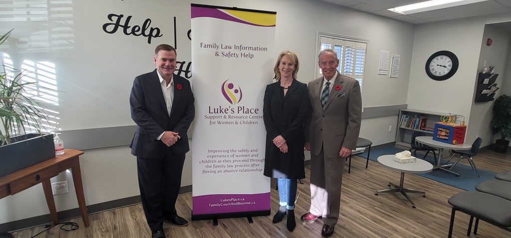 MPPs Todd McCarthy and Lorne Coe with Luke's Place Fund Development and Communications Manager, Laura Oliver